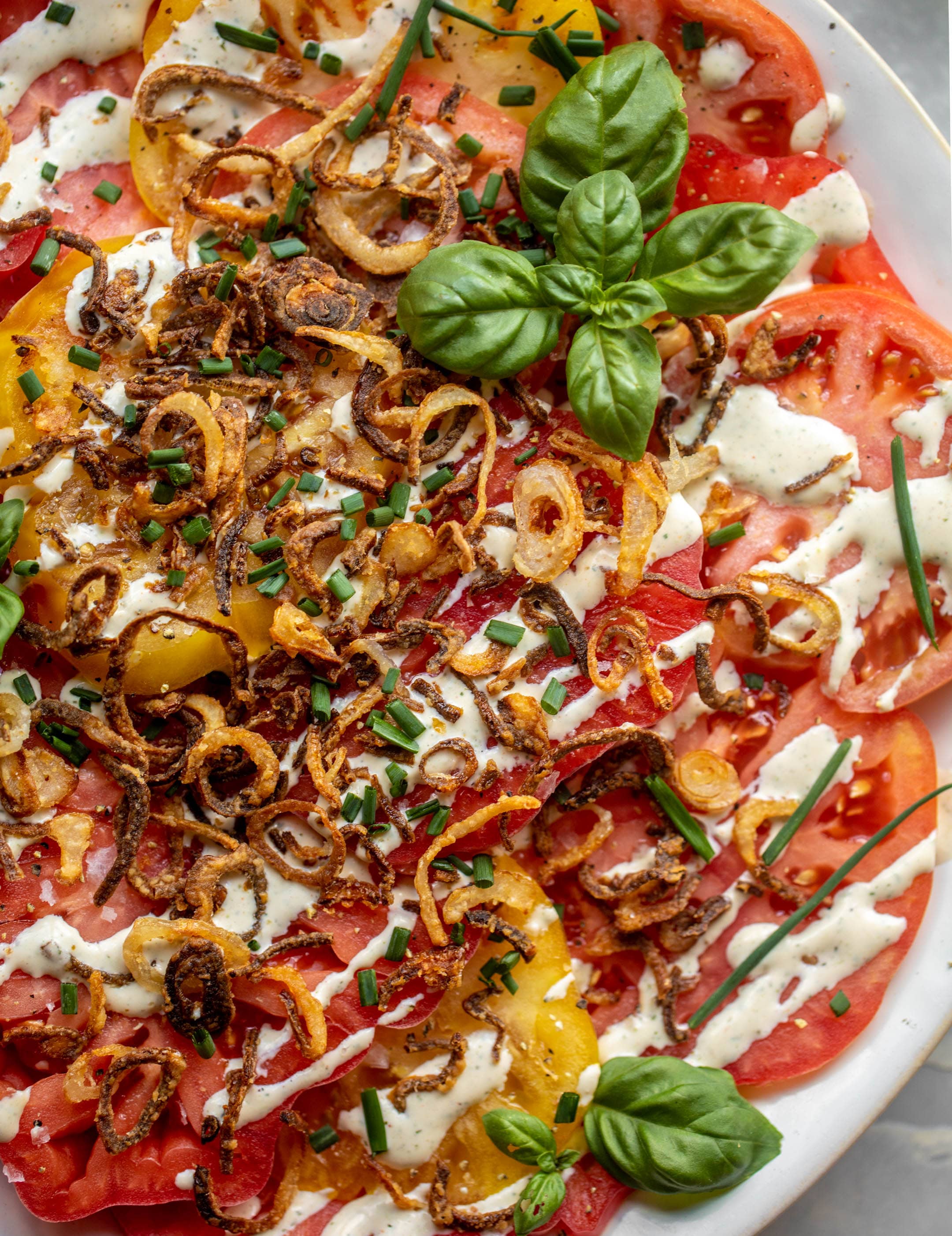 heirloom tomato salad with buttermilk ranch and crispy shallots