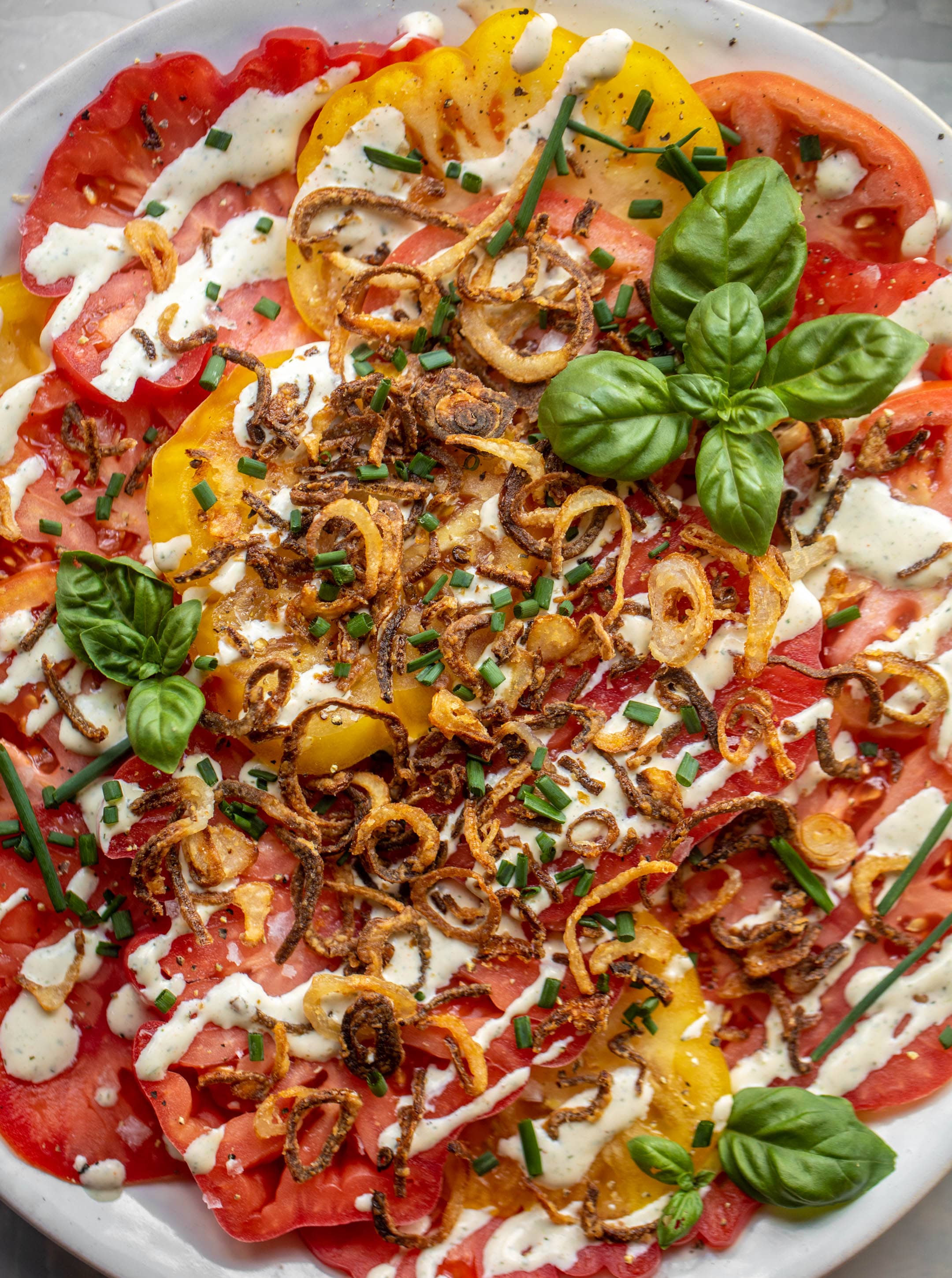heirloom tomato salad with buttermilk ranch and crispy shallots