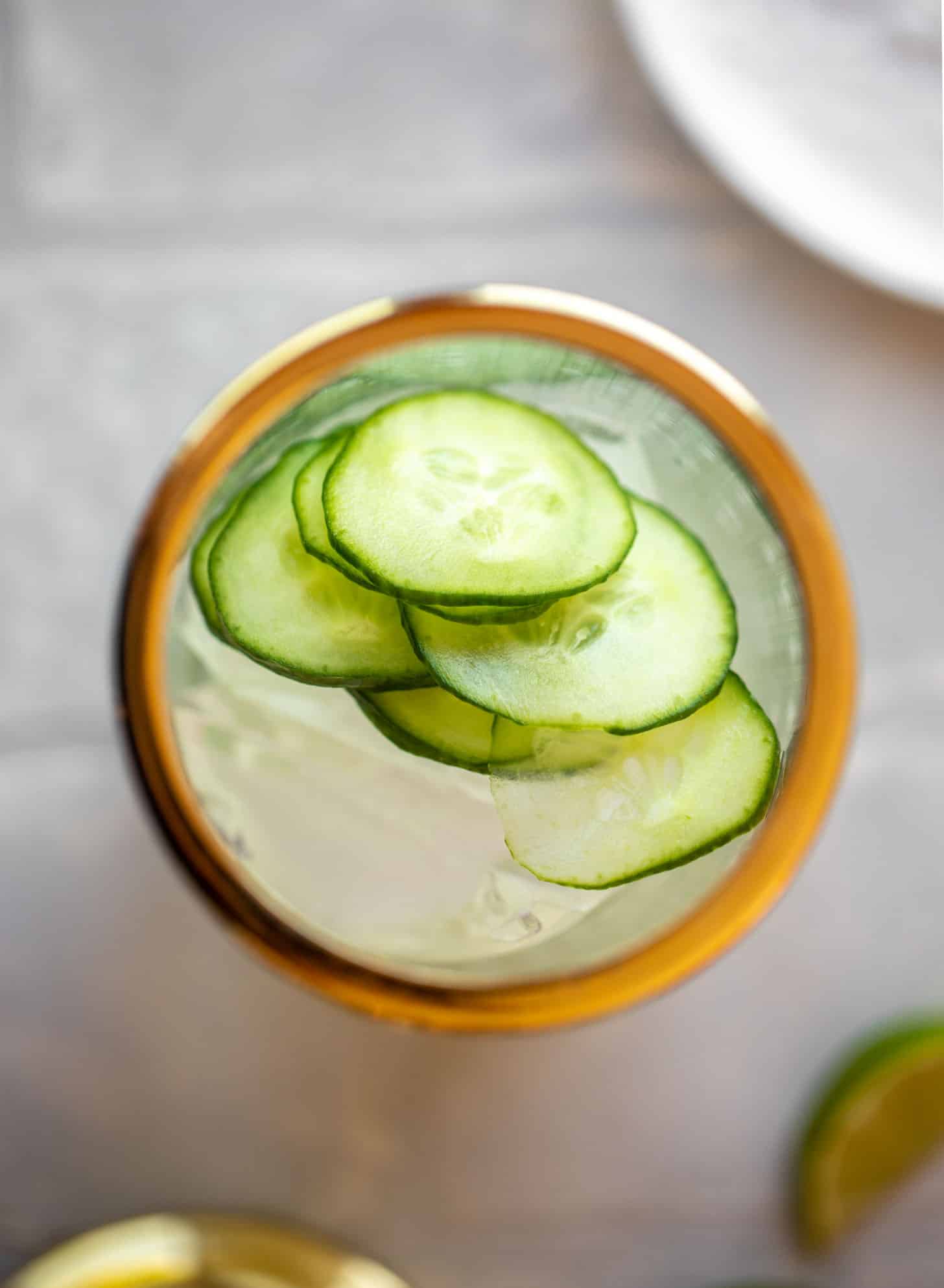 cocktail shaker with cucumbers