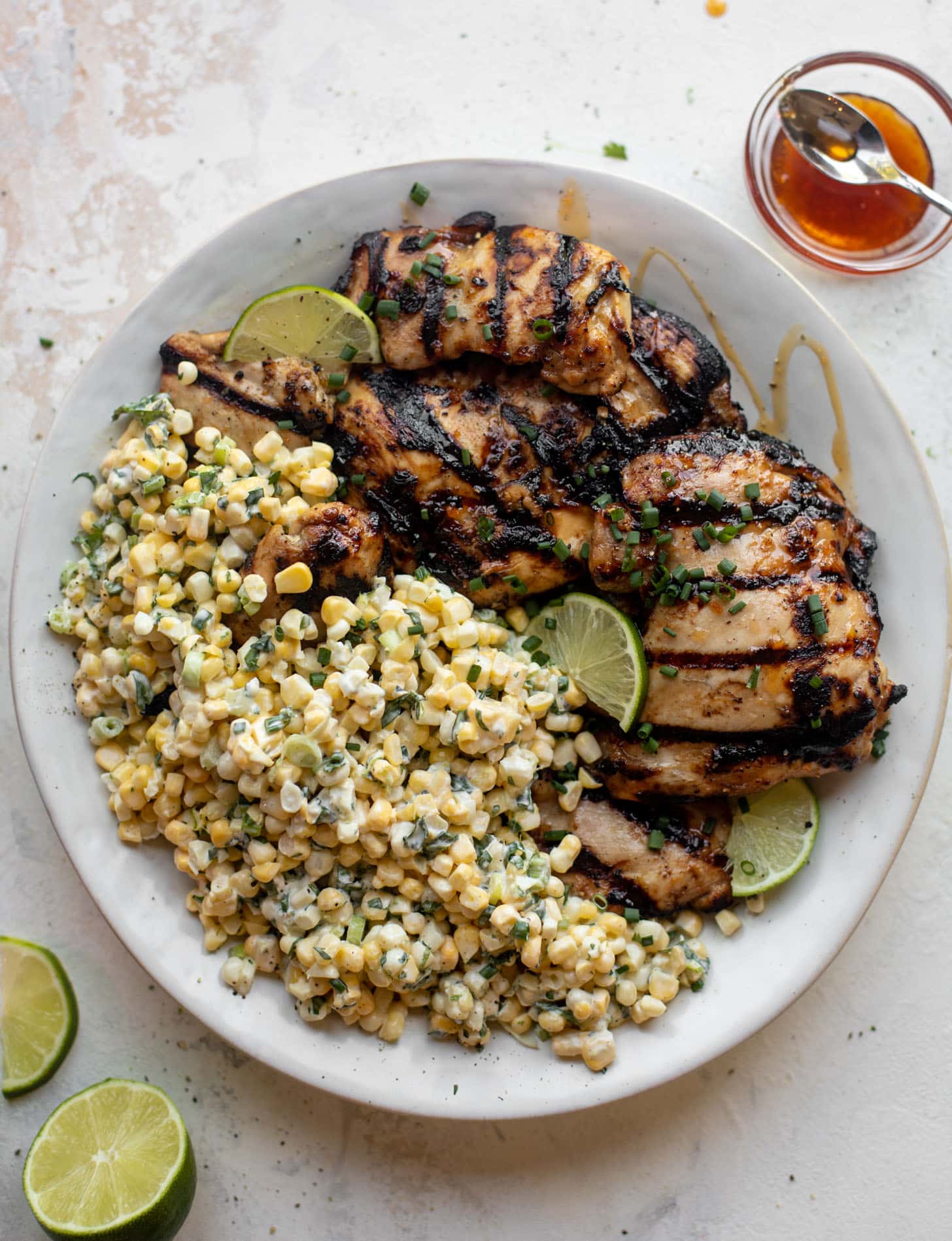 grilled hot honey chicken with lime corn salad