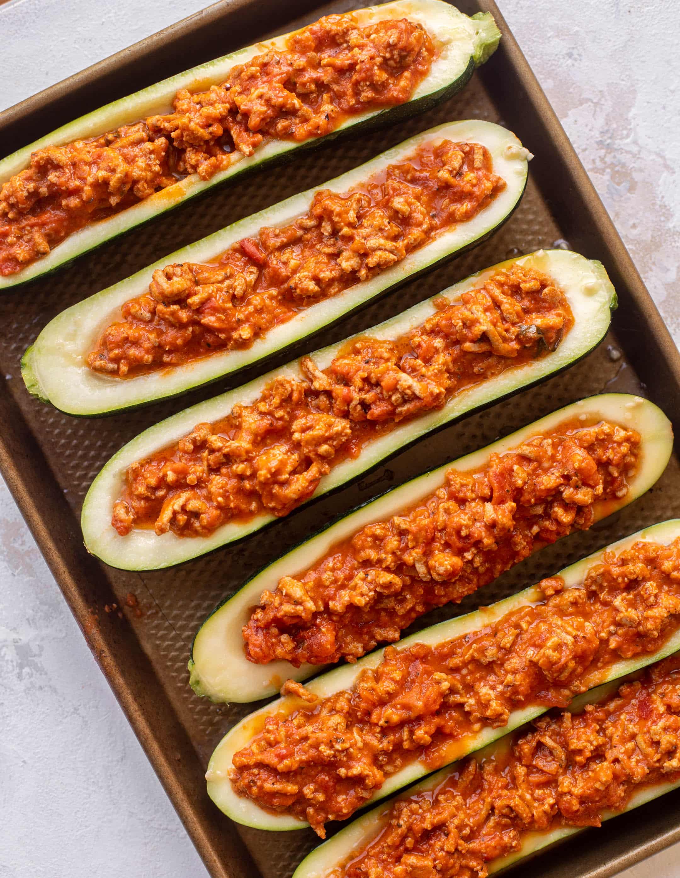 zucchini boats filled with meat sauce