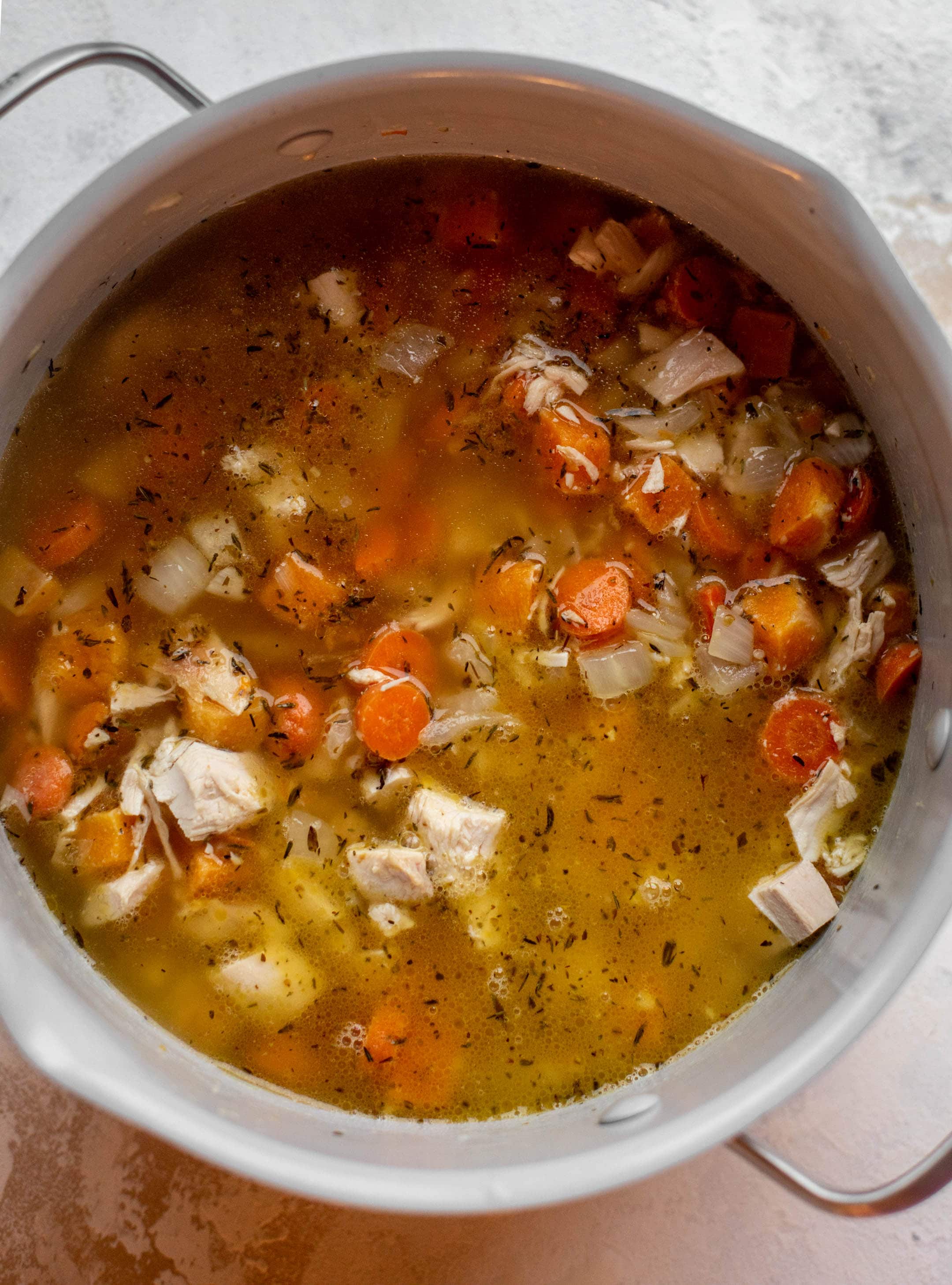 chicken soup in a pot