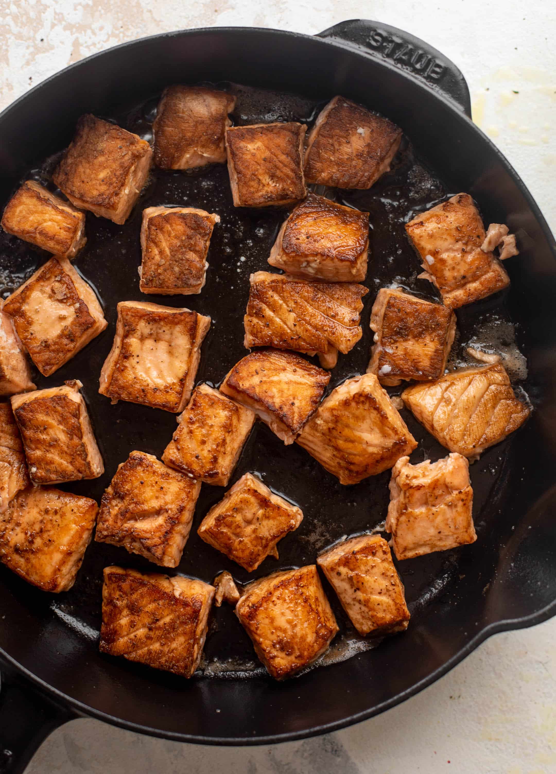 seared salmon in a cast iron skillet