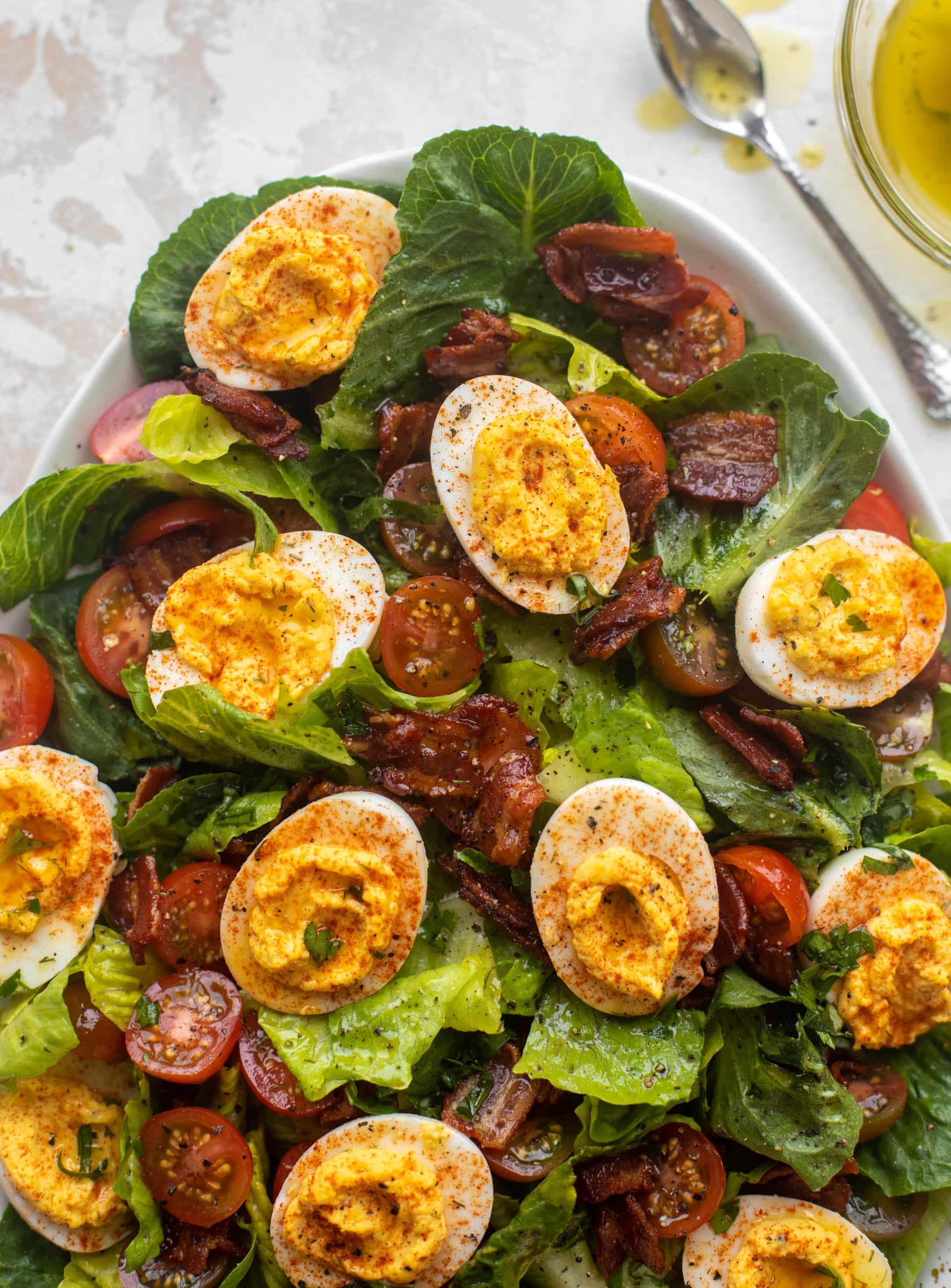 Deviled Egg Salad with Bacon and Tomtaoes