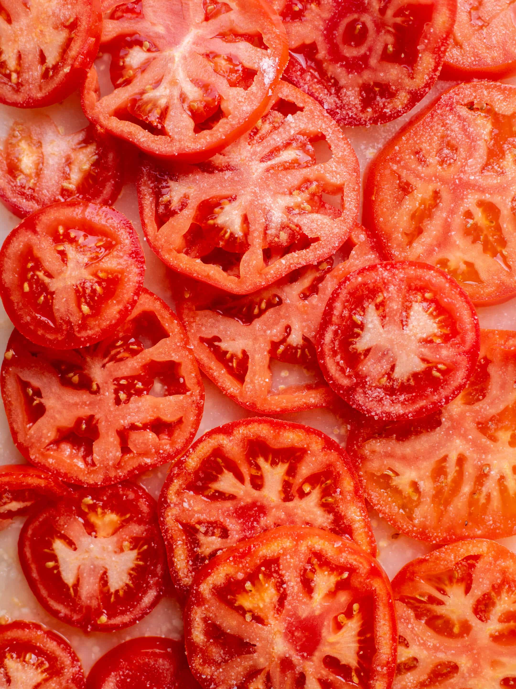 sliced tomatoes with salt
