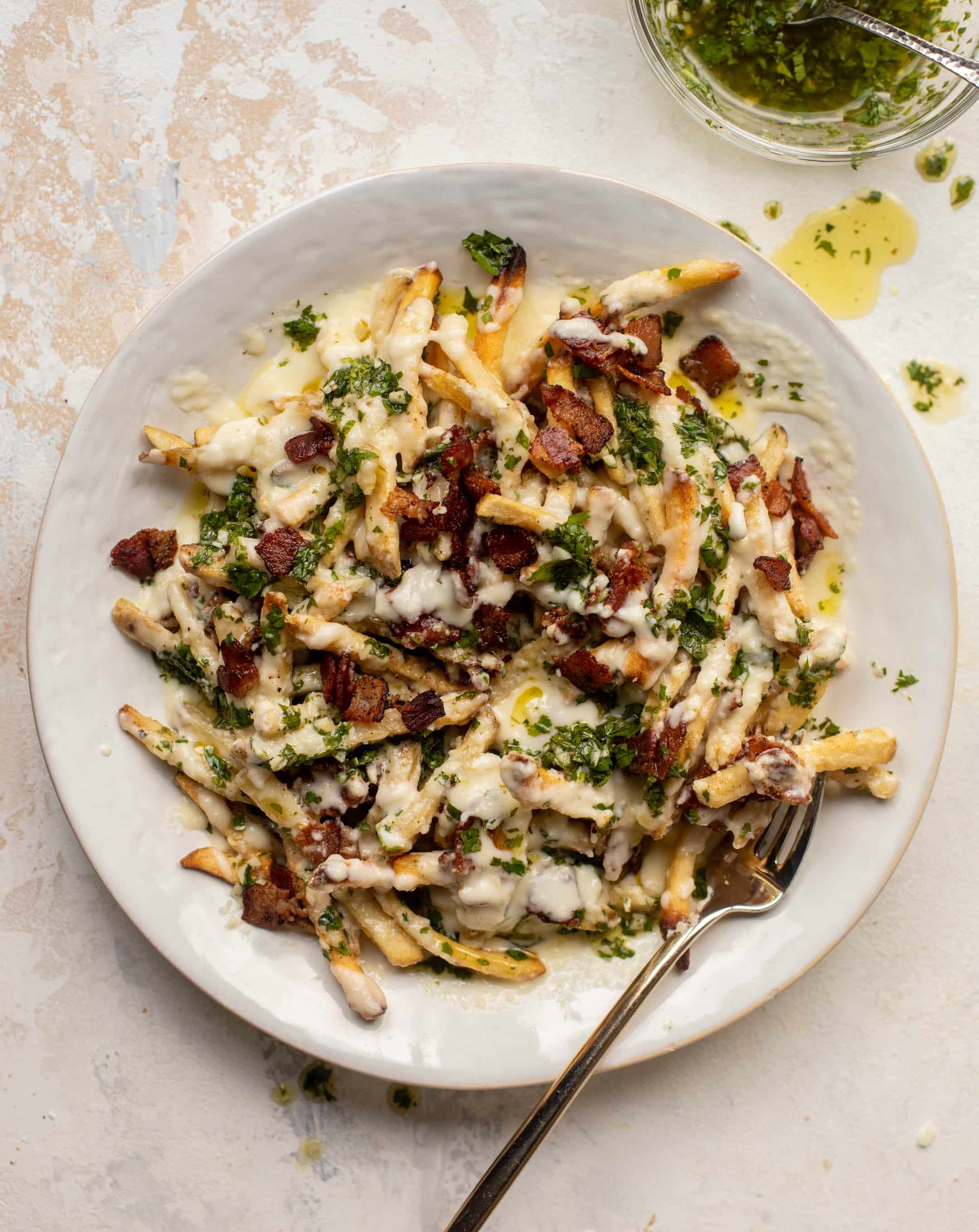 chimichurri cheese fries with chipotle bacon
