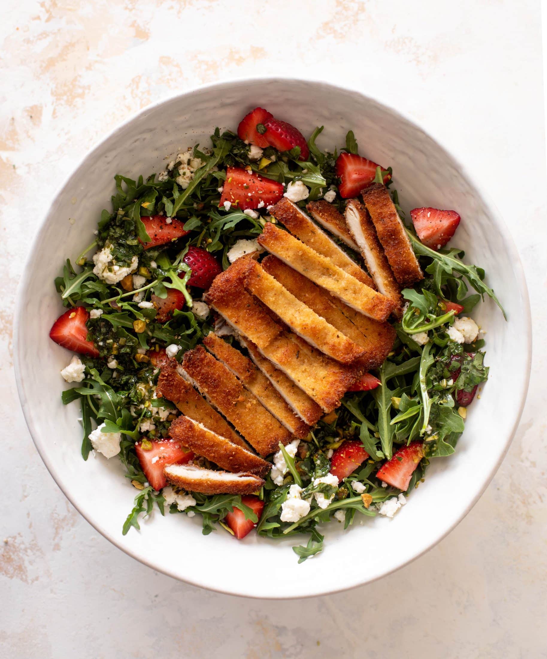 strawberry pistachio salad with crispy chicken