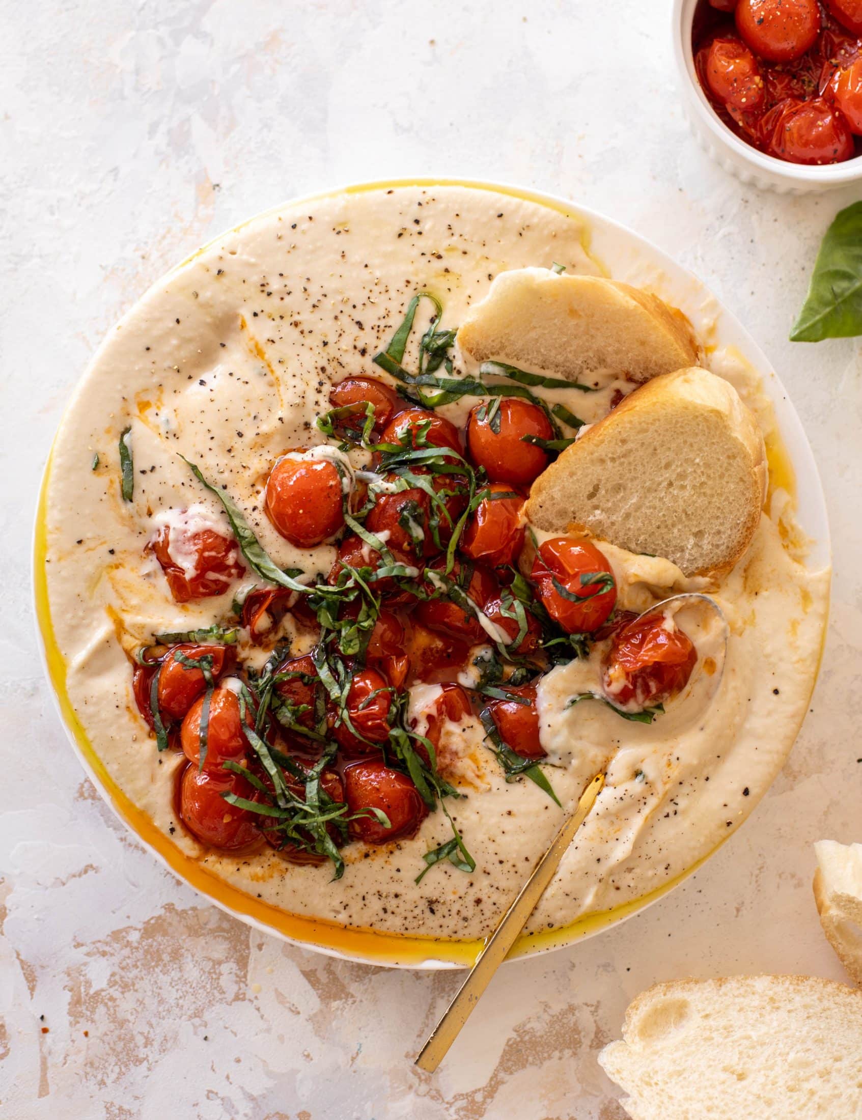 white bean dip with burst tomatoes