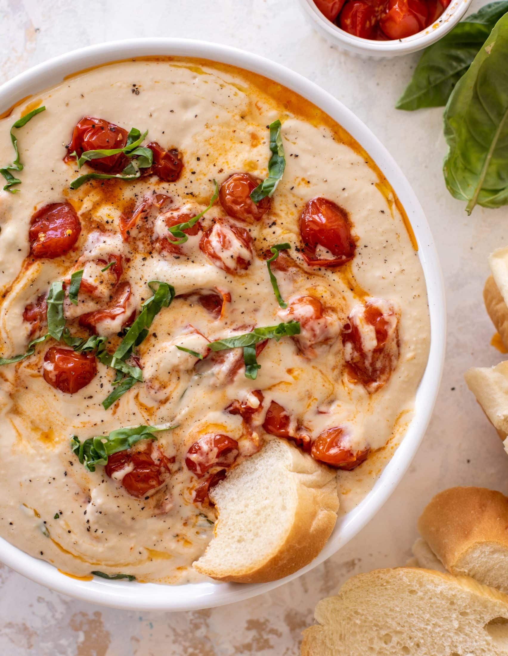 white bean dip with burst tomatoes