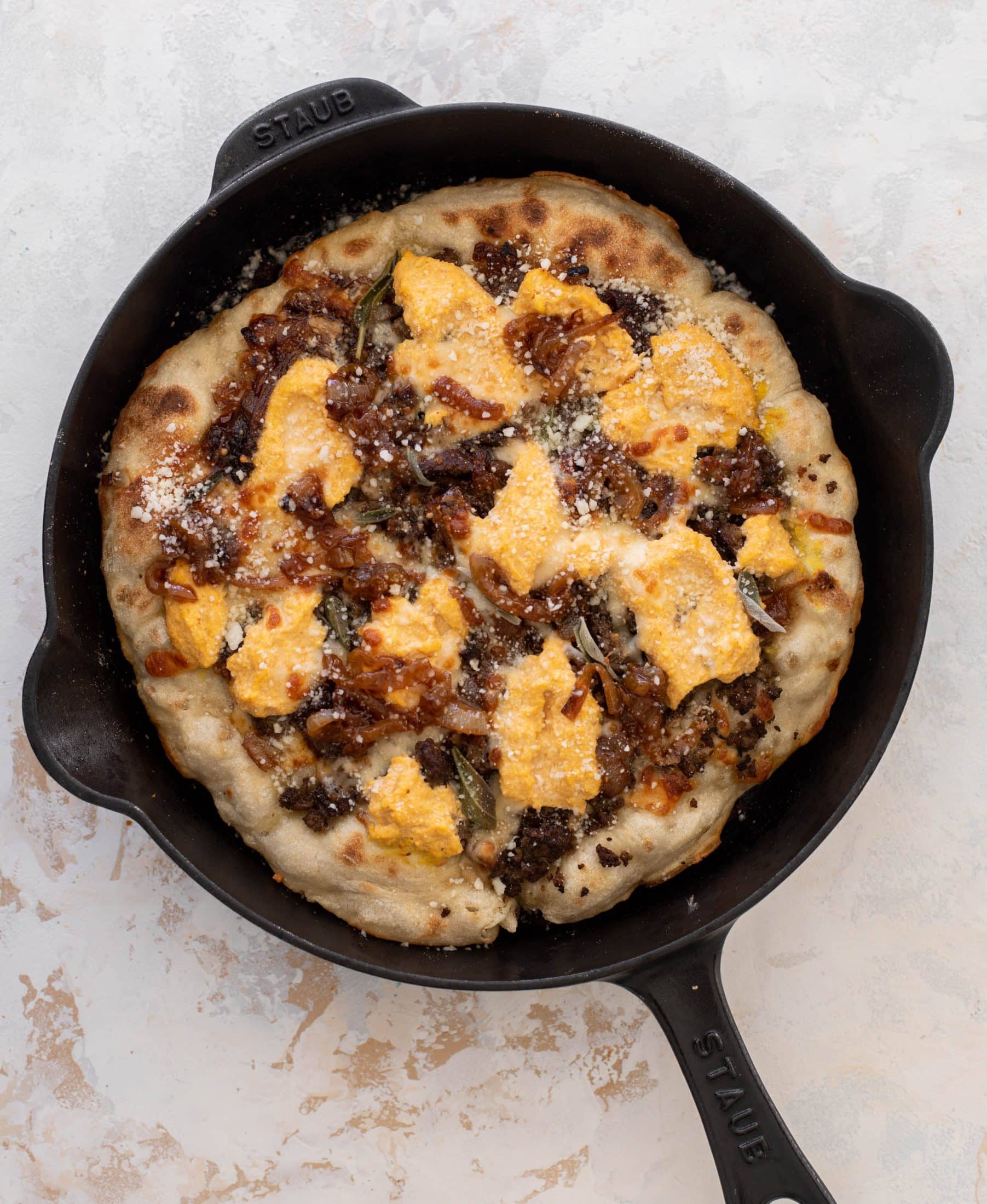 cider caramelized onion skillet pizza