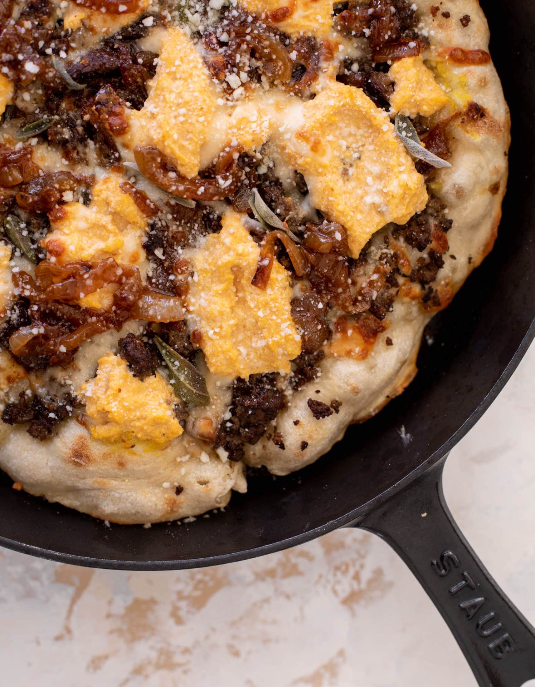 cider caramelized onion skillet pizza